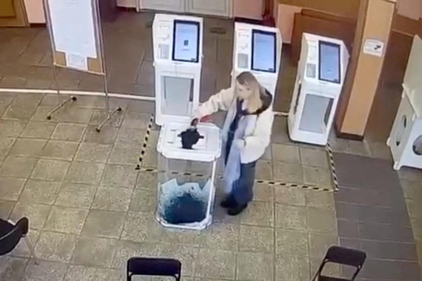 Russian voters vandalize ballot boxes as presidential election starts