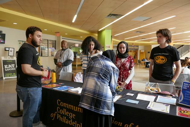 Student volunteers encouraging fellow students to register to vote at Community College in Philadelphia, Pennsylvania, on March 13, 2024.