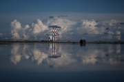 The Cordemais coal-fired power plant in western France on March 10, 2024, behind a field flooded by high tides.