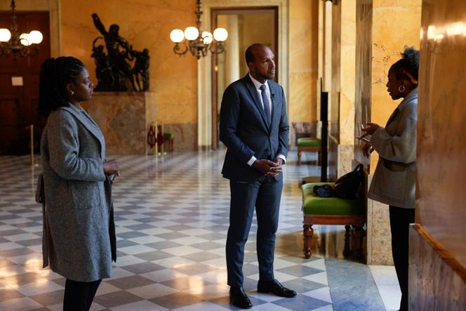 French Assemblée Nationale MP, Olivier Serva, center, is photographed during an interview with The Associated Press, at the Assemblée Nationale, in Paris, Wednesday, March 27, 2024.