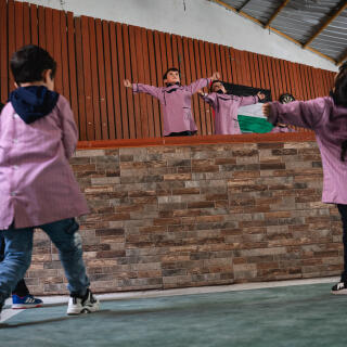 27/03/2024 - Bourj El Barajneh, Beirut, Lebanon - Children rehearse for a performance on Land Day in their kindergarten in the Bourj El Barajneh Camp. The performance which takes place on March 30th commemorates the annexation of Palestinian lands by Israel in 1967.