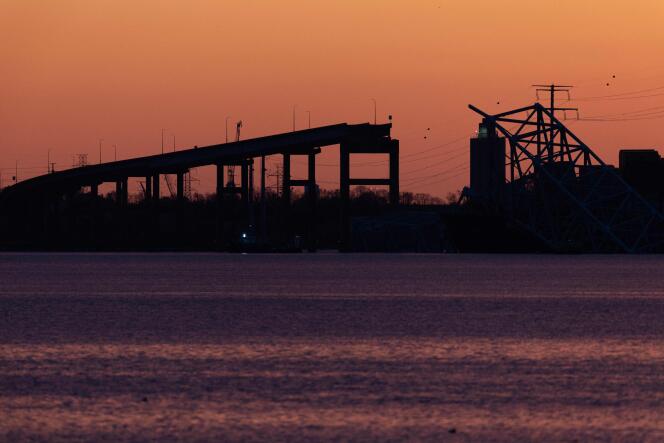 Sunset over the collapsed Francis Scott Key Bridge on March 28, 2024 in Baltimore, Maryland.