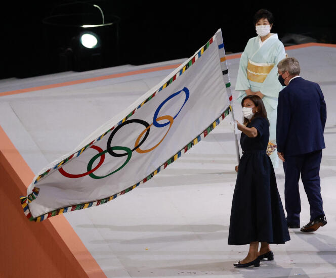 Paris Mayor Anne Hidalgo, masked due to health protocol, at the handover ceremony between Tokyo and Paris as part of the Tokyo Olympics closing ceremony at Shinjuku Ward National Stadium, in Tokyo, on August 8, 2021.