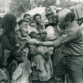 Image 33 - Mohamed Amin filming the Ethiopian famine in Korem in 1984. His images changed the world as the people of Africa and the world responded with one of the greatest acts of philanthropy in human history