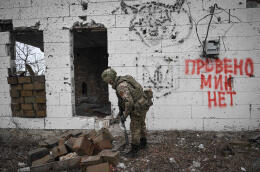 Image provided by state-controlled Russian agency Sputnik - A sapper of the Centre group of forces inspects an area for explosive devices amid Russia's so-called 'military operation' in Ukraine, in the town of Avdiivka near Donetsk, Russian-occupied Ukraine, March 22, 2024. Last month Avdiivka was seized by Russian forces following months of devastating combat. Photo by Stanislav Krasilnikov/Sputnik/ABACAPRESS.COM