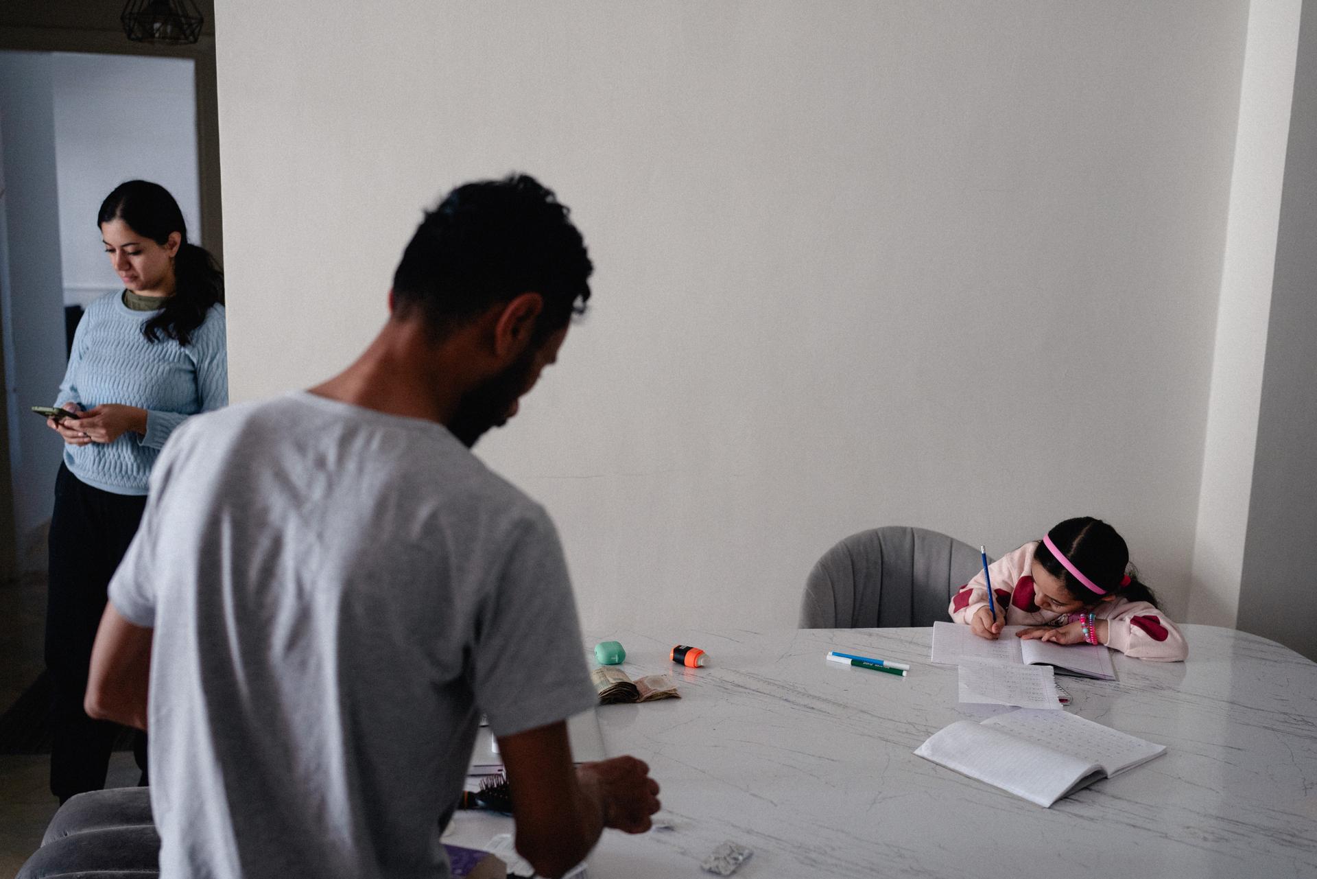 Beirut does her homework at her home in New Cairo, Egypt, on March 31, 2024. She is taking online courses set up by the Palestinian Education Ministry for displaced children from Gaza. Her Arabic teacher is based in Jenin, Palestine.