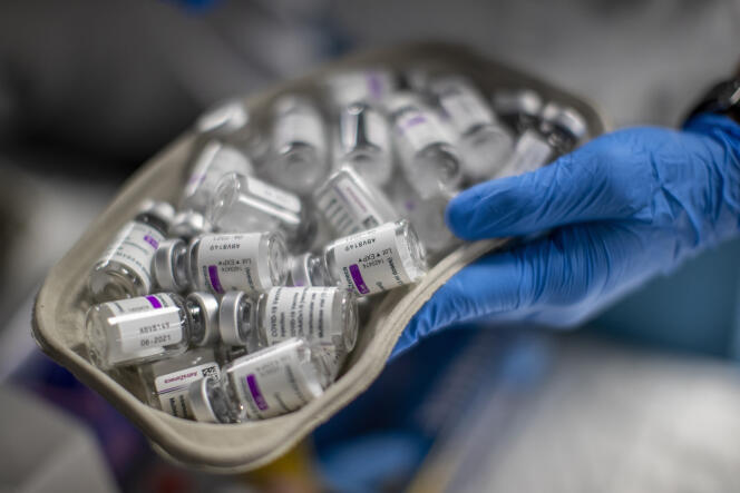 A nurse holds vials of AstraZeneca's Covid-19 vaccine on April 9, 2021. 