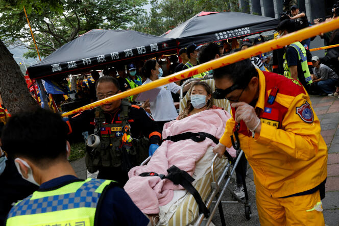 An injured woman is rescued in a remote area after the April 3 earthquake around Hualien, Taiwan, April 4, 2024.