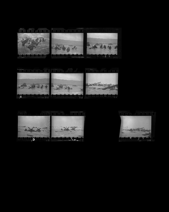 At 6 am on June 6, 1944, Robert Capa landed on Omaha Beach and scored the scoop of the century | WN24 3 Only nine shots remain on the contact sheet. The most interesting one, of the soldier emerging from the wave, is missing.