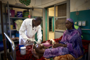 A doctor giving therapeutic milk to a malnourished child at the pediatric center of the hospital in Gao (Mali) on October 14, 2020.