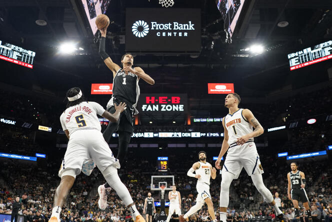 Apr 12, 2024; San Antonio, Texas, USA; San Antonio Spurs forward Victor Wembanyama (1) goes up to dunk over Denver Nuggets guard Kentavious Caldwell-Pope (5) and forward Michael Porter Jr. (1) during the first half at Frost Bank Center. Mandatory Credit: Scott Wachter-USA TODAY Sports