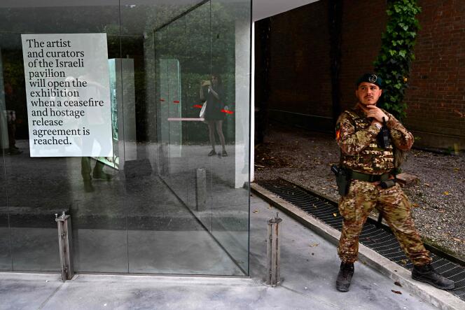 An Italian soldier stands guard in front of the Israel Pavilion during the pre-opening of the Venice Biennale on April 16, 2024.