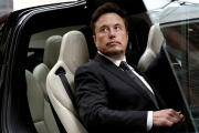 Tesla Chief Executive Officer Elon Musk gets in a Tesla car as he leaves a hotel in Beijing, China, on May 31, 2023.