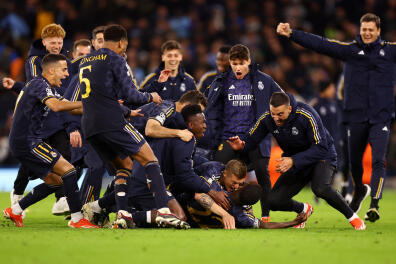 Soccer Football - Champions League - Quarter Final - Second Leg - Manchester City v Real Madrid - Etihad Stadium, Manchester, Britain - April 17, 2024
Real Madrid players celebrate winning the penalty shootout REUTERS/Carl Recine
