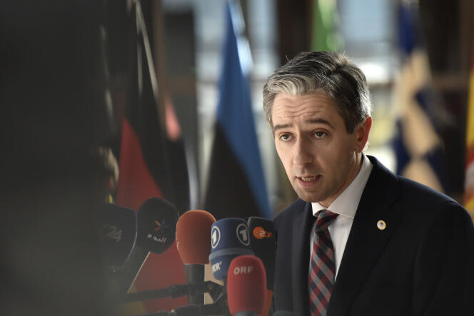 Ireland's Prime Minister Simon Harris speaks with the media as he arrives for an EU summit in Brussels, Thursday, April 18, 2024.