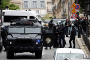 Police, including members of the Research and Intervention Brigade, secure the area near the Iranian consulate, Paris, France, April 19, 2024.