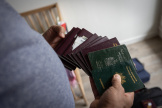 Bassam (nom d’emprunt) montre les passeports français de sa famille après leur sortie de Gaza. Le 29 mars 2024, dans le sud-est de la France.