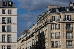 A photograph taken on April 18, 2024, shows Haussman style buildings in Paris. (Photo by JOEL SAGET / AFP)