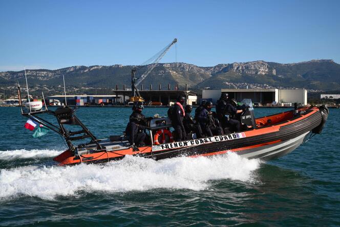 French Customs Coast Guards take part in a training exercise aiming at testing the security plans for the Olympic torch relay, at sea, off the coast of the southern French city of Toulon on April 24, 2024.