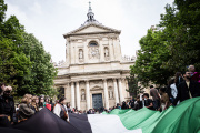 Students unfurl a huge Palestinian flag in Place de la Sorbonne, Paris, April 29, 2024.