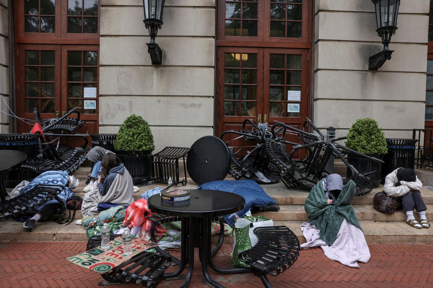 Columbia University threatens to expel student protesters barricading Hamilton Hall