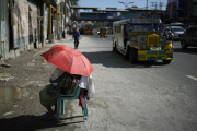 A female street vendor on a street in Manila, Philippines, April 29, 2024.