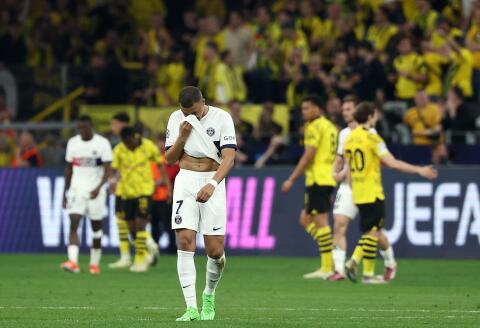 Paris Saint-Germain's French forward #07 Kylian Mbappe reacts at the end of the UEFA Champions League semi-final first leg football match between Borussia Dortmund and Paris Saint-Germain (PSG) in Dortmund, western Germany on May 1, 2024. Dortmund won the match 1-0. (Photo by FRANCK FIFE / AFP)