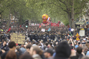 Thousands of people march during the May Day demonstration, Wednesday, May 1, 2024 in Paris.