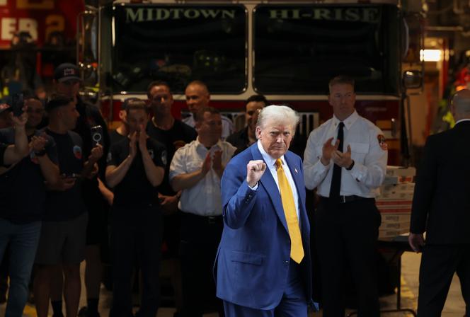Donald Trump campaigns at a New York fire station on May 2, 2024.