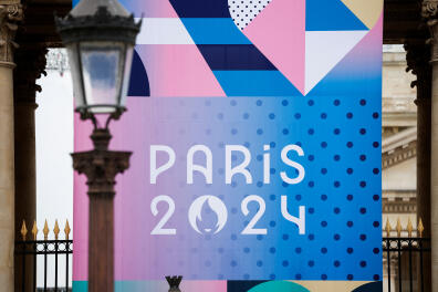 The logo of the Paris 2024 Olympic and Paralympic Games is pictured in front of the National Assembly in Paris, France, May 2, 2024. REUTERS/Benoit Tessier