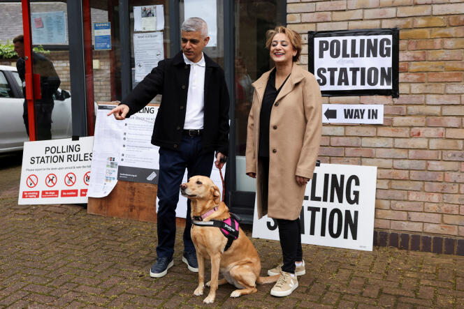 London Mayor Sadiq Khan and his wife Saadiya Khan outside a polling station during the local elections in London on May 2, 2024. 