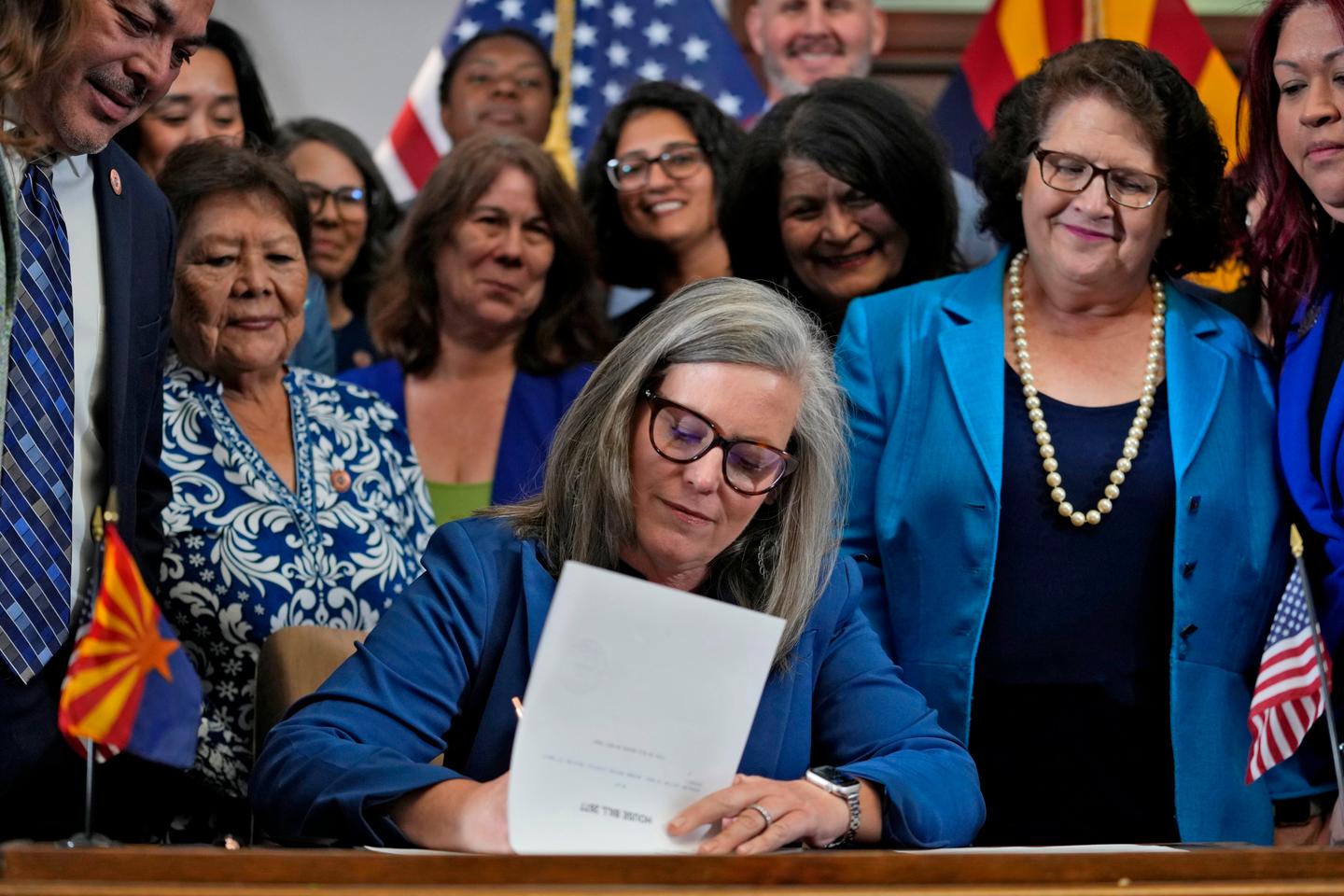 Arizona governor signs bill overturning 1864 abortion ban