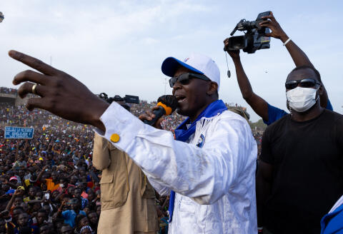 Chad's Prime minister and presidential candidate Succes Masra delivers a speech during a campaign meeting at the stadium in the Dombao district, in Moundou, on April 28, 2024. (Photo by Joris Bolomey / AFP)