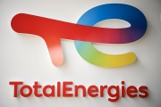 This photograph taken on May 28, 2021 shows the new TotalEnergies logo during its unveling ceremony, at La Defense on the outskirts of Paris. 
