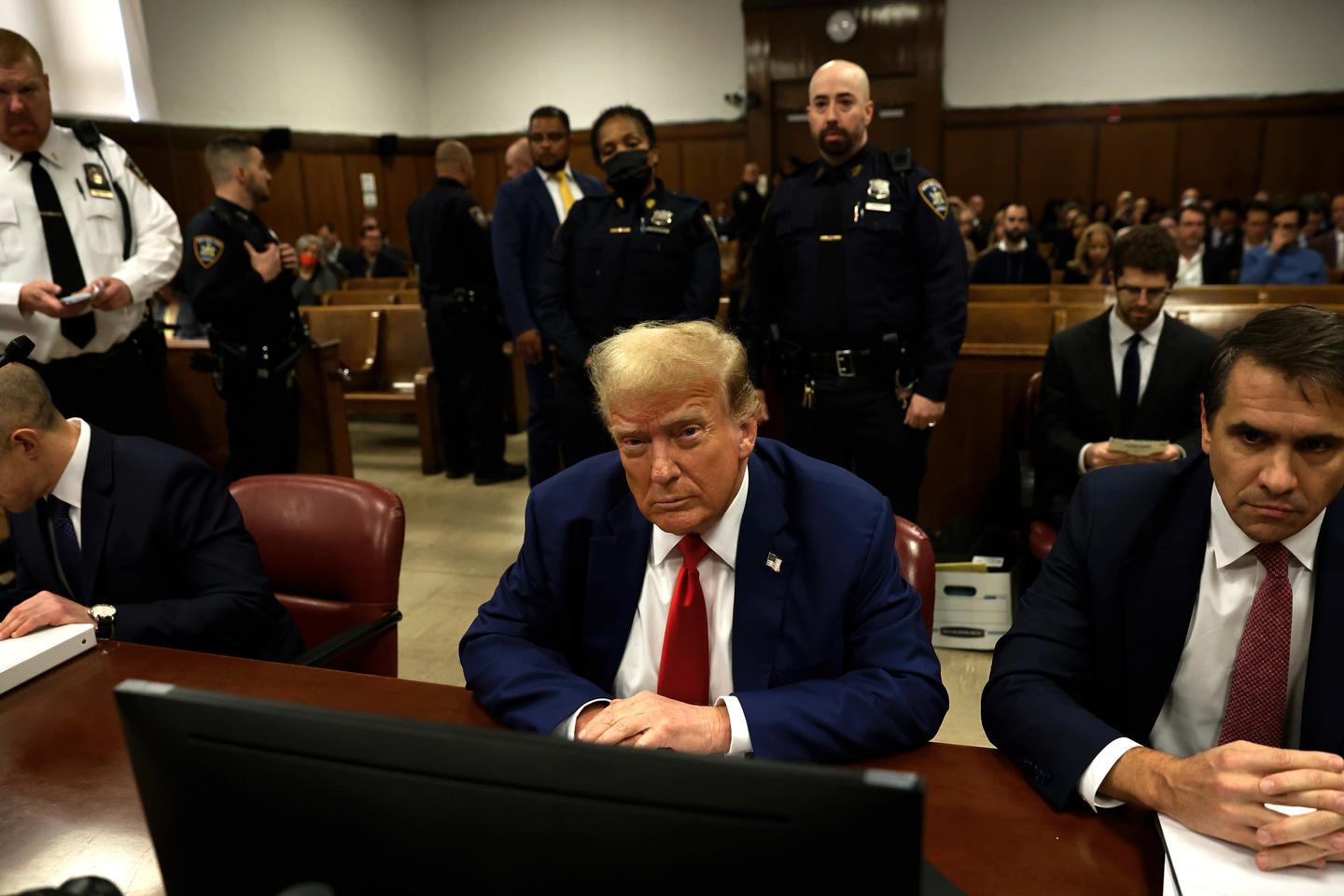 Trump fined and threatened with jail for gag order violations