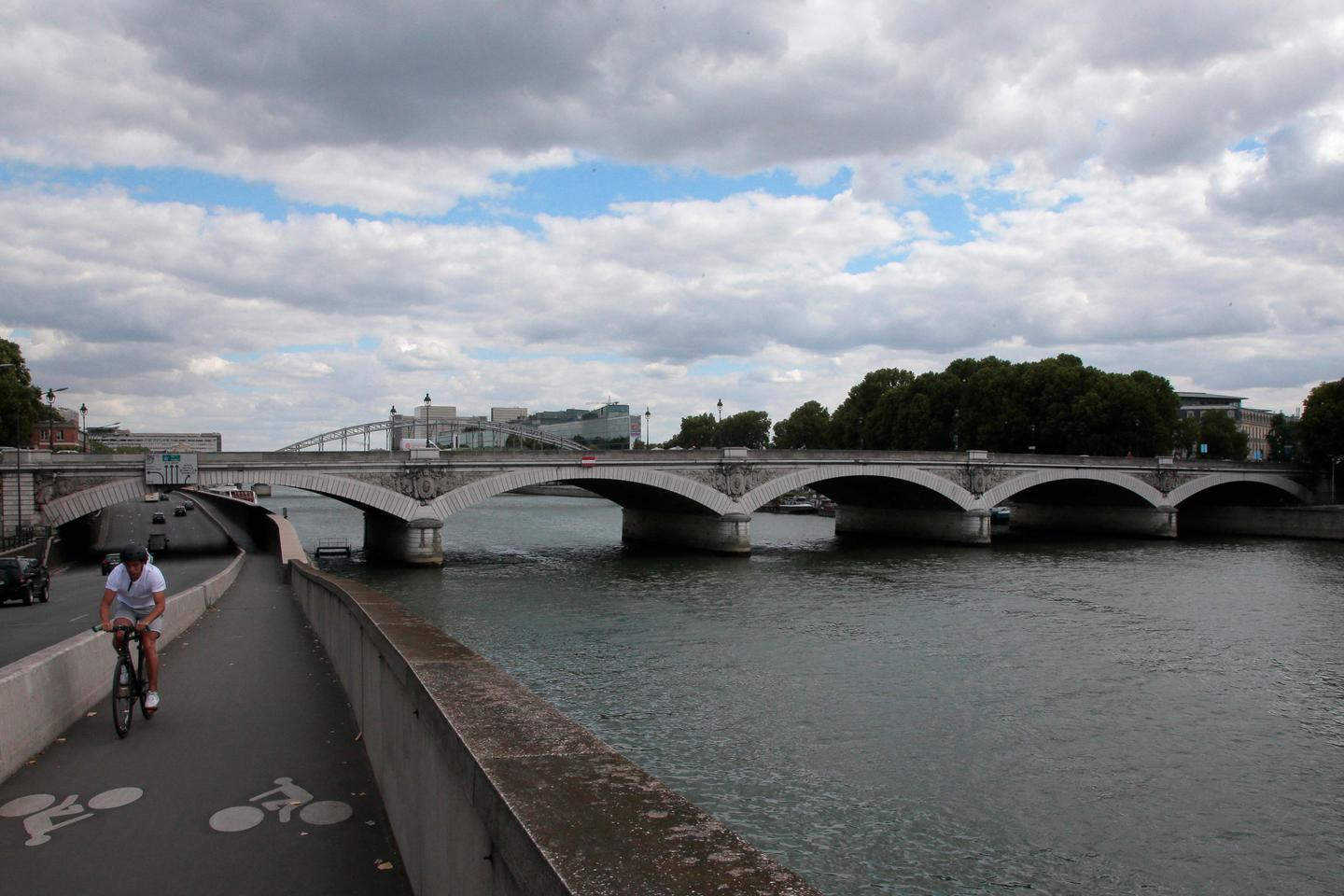 Man charged after dismembered body found under Paris bridge