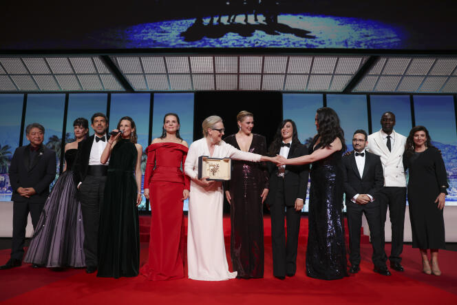 The jury for the 77th edition of the Cannes Film Festival, presided over by Greta Gerwig (center), at the opening ceremony on May 14, 2024.