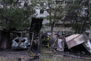 Firefighters work at the site of a Russian air strike, amid Russia's attack on Ukraine, in Kharkiv, Ukraine May 14, 2024.
