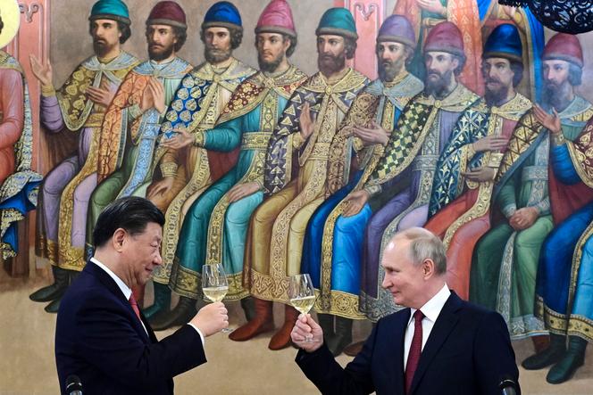 Chinese President Xi Jinping and Russian President Vladimir Putin at a dinner at the Palace of Facets, a Kremlin building, in Moscow, March 21, 2023.