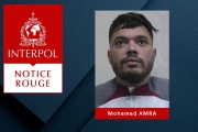 This undated handout Red Notice (Notice Rouge) image released by Interpol on May 15, 2024, shows Mohamed Amra posing at an undisclosed location.