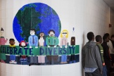 A mural celebrating diversity decorates a hallway in Lewiston High School in Lewiston, Maine, March 15, 2017.