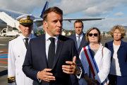 French President Emmanuel Macron speaks with the press upon arrival at Nouméa – La Tontouta International airport, New Caledonia, May 23, 2024. 