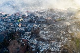 Aerial view of houses destroyed by a forest fire that affected the hills of Vina del Mar, in the Valparaiso region, Chile, taken on December 23, 2022.