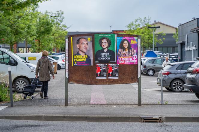 Election posters in Auch, May 16, 2024.