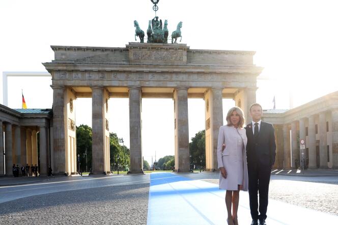 Emmanuel Macron and his wife, Brigitte Macron, in front of the Brandenburg Gate, Berlin, during an official visit to Germany, May 26, 2024.  