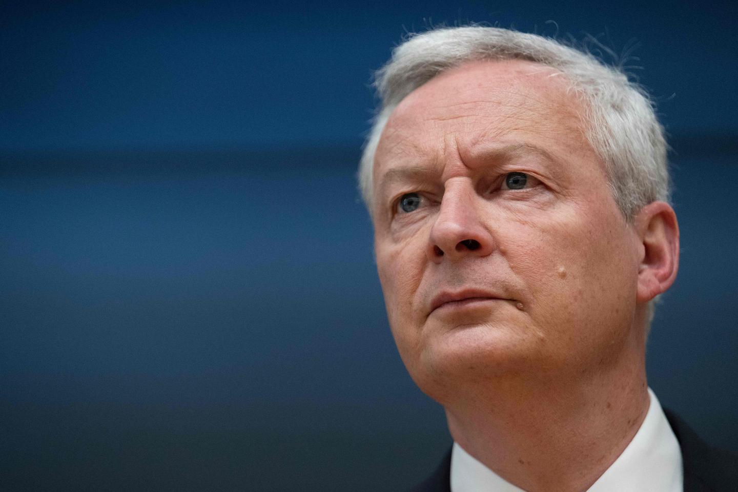 French finance minister says credit rating cut means savings needed
