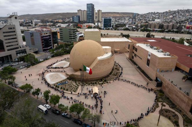 Mexico elects Claudia Sheinbaum as first female president in landslide win | WN24 3 Aerial view showing people queueing to cast their vote on a special polling station at Centro Cultural Tijuana during the general election, in Tijuana, Baja California state, Mexico, on June 2, 2024.