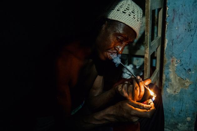 Claudinho, 40, in a boarding house in Cracolândia, Sao Paulo (Brazil).