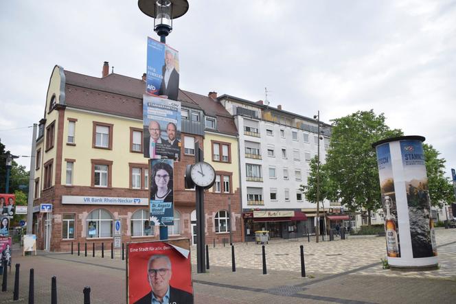 Far-right AfD politician stabbed in Germany | WN24 1 Election posters from various parties hanging on a lamp post in Mannheim, Germany, Wednesday, June 5, 2024, where an AfD local council candidate was attacked with a knife late on Tuesday evening.