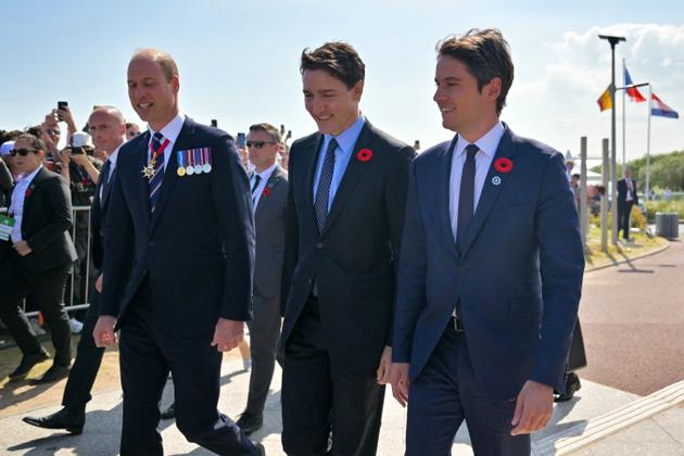 Britain's Prince William, Canadian Prime Minister Justin Trudeau and France's Prime Minister Gabriel Attal arrive to attend the Canadian commemorative ceremony, at the Juno Beach Centre near the village of Courseulles-sur-Mer, in northwestern France, on June 6, 2024. 